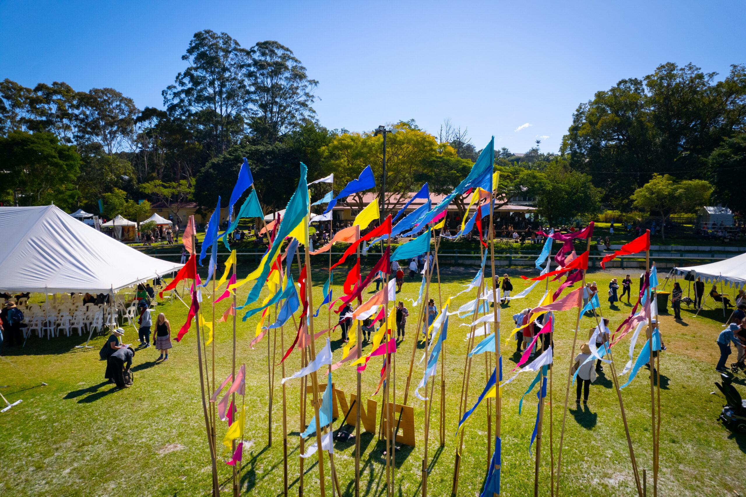 https://byronwritersfestival.com/wp-content/uploads/2023/08/Flags-from-the-sky-scaled.jpg